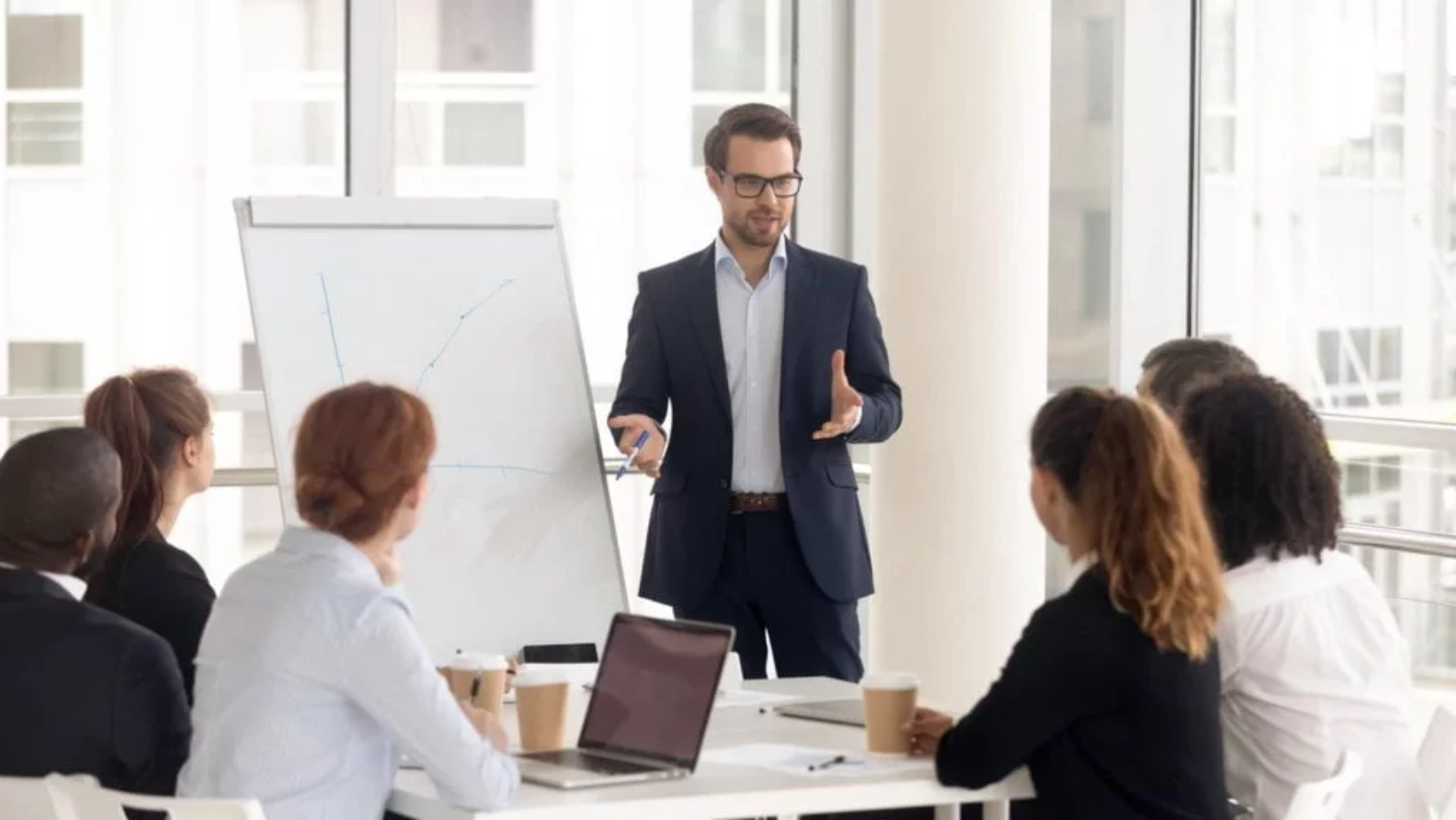 Man presenting in boardroom