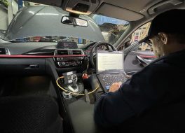 BMW under bonnet with tech standing_small